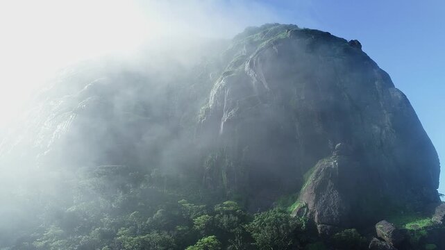 View of mountain landscape with large cliff showcasing rugged terrain and scenic natural beauty