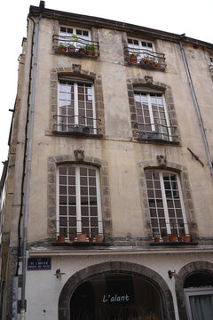 CLERMONT-FERRAND, FRANCE - APRIL 28, 2026: Facade of a house on Rue de l'Ancien Poids de Ville