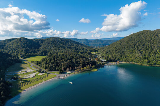 The shoreline of Lake Tikitapu, also known as the Blue Lake, near Rotorua, New Zealand. Aerial view