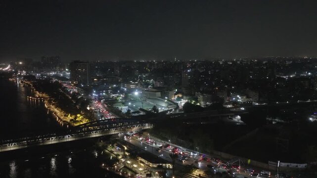 Zamalek, Cairo, Egypt Nile River Traffic and Cityscape Night Cinematic Drone Shot