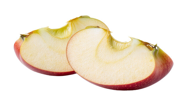Two red apple slices showing seeds and core, isolated on transparent background