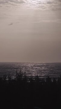 Vertical Aerial View of Sun Rays Over Sea at Apsarakonda Karnataka India