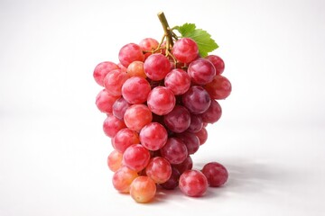 Naklejka premium Vibrant pink grape cluster placed on a neutral white background