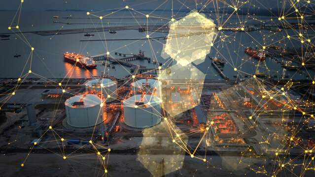 Glowing digital network overlay on a massive LNG tanker docked at an industrial energy terminal. Smart port technology, IoT logistics, and big data integration in global natural gas supply chain.