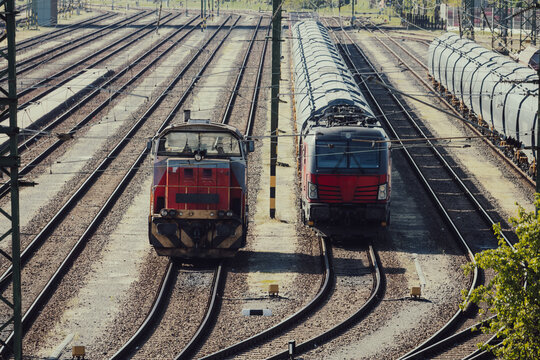 Freight locomotives on parallel railway tracks