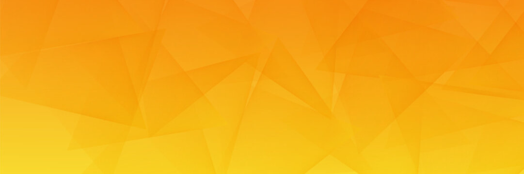 Abstract yellow and orange geometric banner background with dynamic overlapping triangles and vibrant gradient