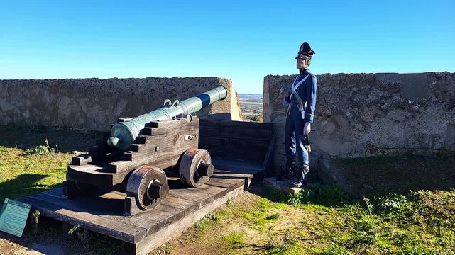 Cannon and gunner from the Portuguese colonial era. Santa Luzia Castle. Elvas. Portugal.