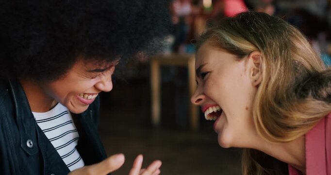 Happy women, friends and laughing with food in cafe for funny joke, goofy or bonding together. Female people, playing or throw with silly catch, feeding or eating for humor in restaurant or shop