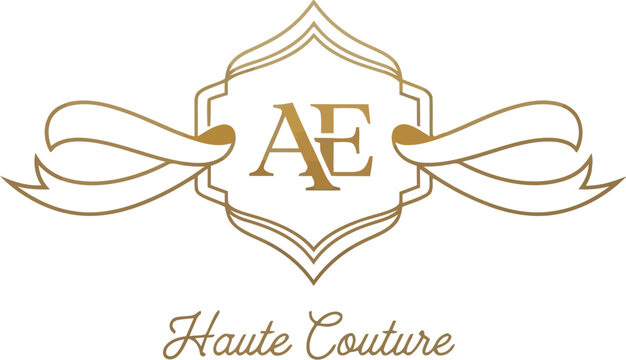 gold elegant monogram logo design with laurel wreath for luxury brand identity