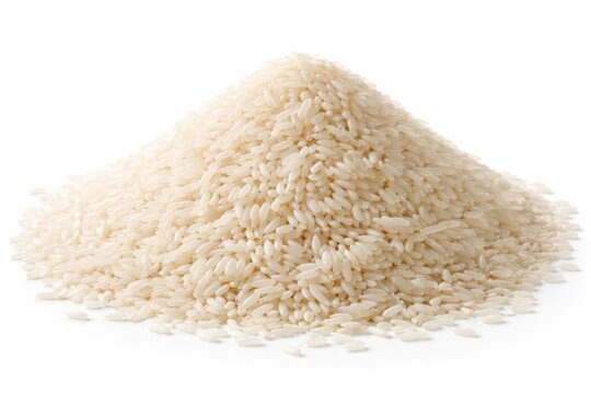 Stacked uncooked white rice on a bright white studio background