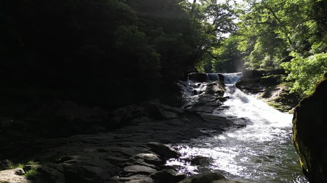 Shijusanman Waterfall, Kikuchi Gorge Japan | Top 100 Waterfalls, Fresh Green Forest and Clear Stream Reflection Aerial Drone Background