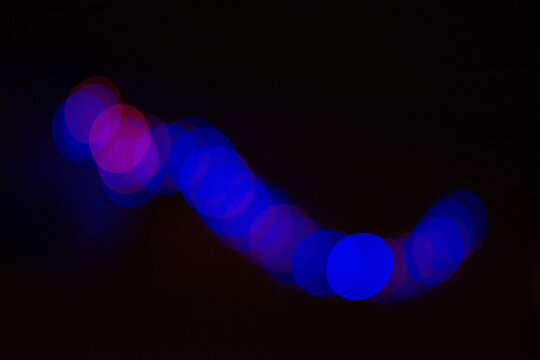 Abstract blue and pimk bokeh lights backround with copy space