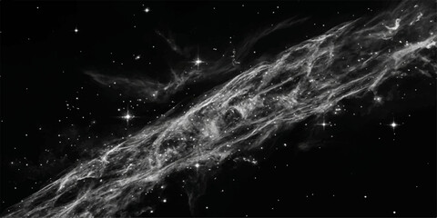 Captured in striking monochrome, the image shows a celestial wonder, a delicate nebula extending across the vast expanse of space, speckled with distant stars. © DAKU MOHARAJ