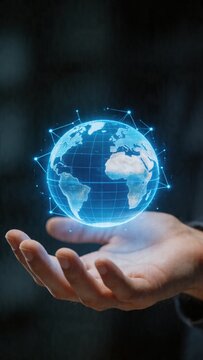 This depicts a person's hand gently holding a glowing blue digital globe, representing the connection between humanity and technology. The globe is surrounded by a network of lines and dots