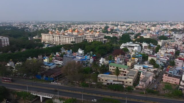 JSS Hospital with Srikanta High School, Residential buildings and flyover at Mysuru, karnataka, india. day time, push back shot, drone shot, 4k.