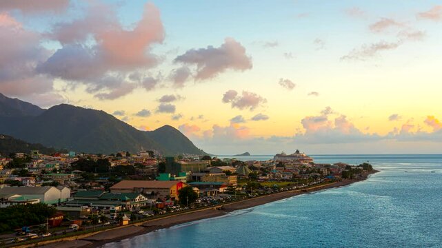 Sunset aerial hyperlapse of traffic on waterfront at Pottersville, Dominica