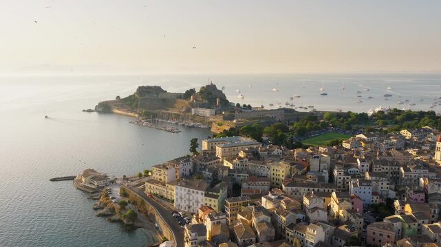 Aerial View of Corfu Old Town, Greece at Sunrise with Fortress Peninsula, Historic Architecture