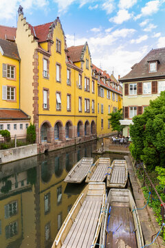 Wooden flat-bottomed boats in the Lauch river in Colmar, France