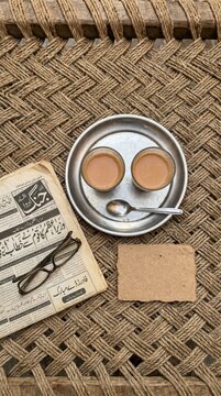 Father's day 2026 abbu aur chai Urdu English tag golden hour village charpai two cutting chai newspaper spectacles Kraft card mockup for Instagram