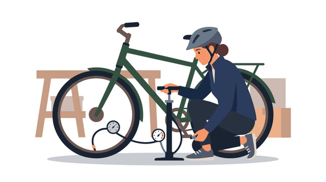 Cyclist repairing bicycle with tools in workshop.