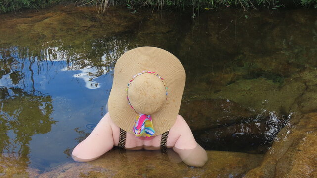 Woman on the river