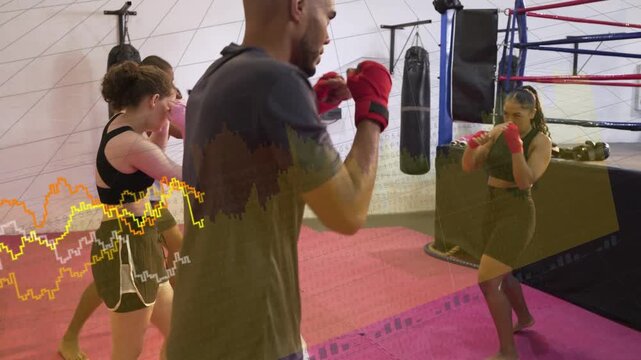 Four trainees starting boxing drill on cue, doing jab-crosses by heavy bags with waves overlaying