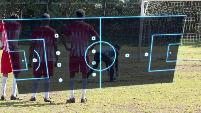 Four defenders forming wall at goal, attacker placing ball to score, sports HUD drawing right lines