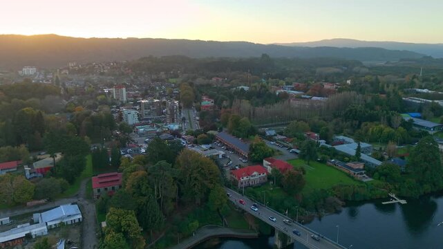 Aerial Dolly In of Teja island University District and Bridge in Valdivia Chile