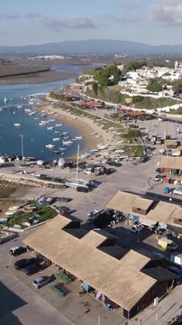Vertical aerial panoramic view of Alvor Harbour in the Algarve, Portugal.