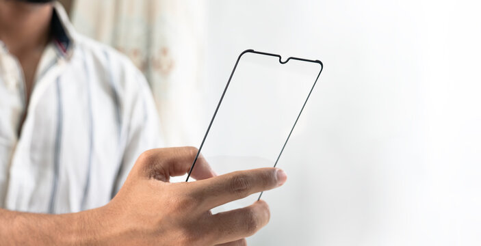 Hands holding blank smartphone mockup man displaying