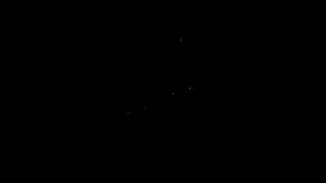 A close-up of an incandescent light bulb hanging in the darkness and going out due to a power outage