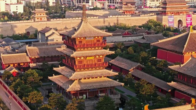 Ancient Chinese Temple Complex and Xi'an City Wall at Sunset