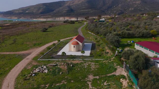 Cinematic Aerial Boomerang Orbit of Modern Agia Paraskevi Church near Kouris Dam Cyprus