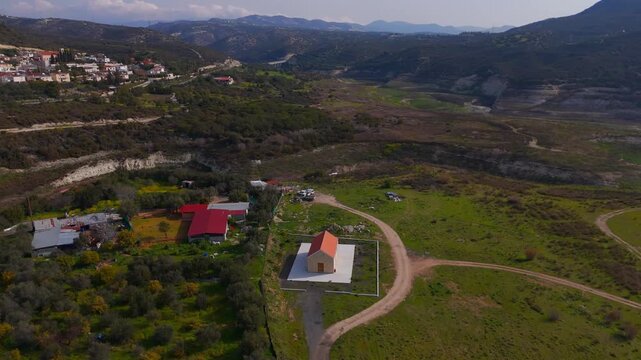 Aerial View Orbiting Modern White Agia Paraskevi Church Near Limassol Cyprus