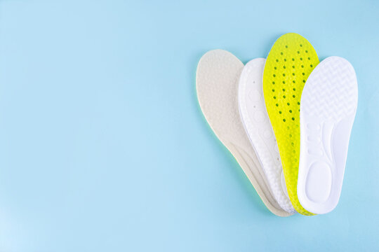 Comfortable Running Insoles, healthy sport shoe insoles with foot support, revention of flat feet and orthopedic diseases of the foot. Foot care, foot comfort