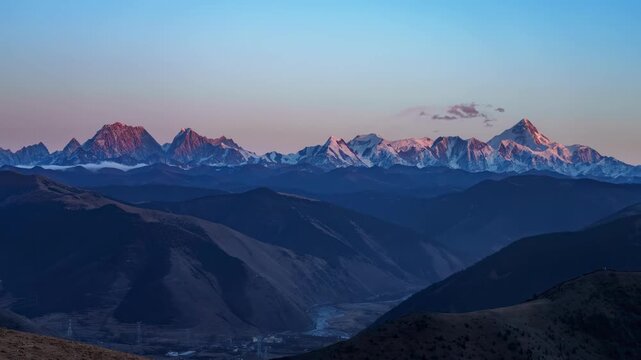 Snowy Himalayan Mountain Range Over Valley at Dawn