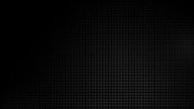Abstract dark carbon fiber background with a subtle gradient and light reflection