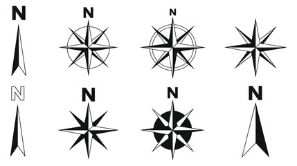 Compass Rose Collection, Set of eight black and white north arrow and compass rose symbols for map navigation and orientation featuring various geometric star shapes  © Vector By Thakur