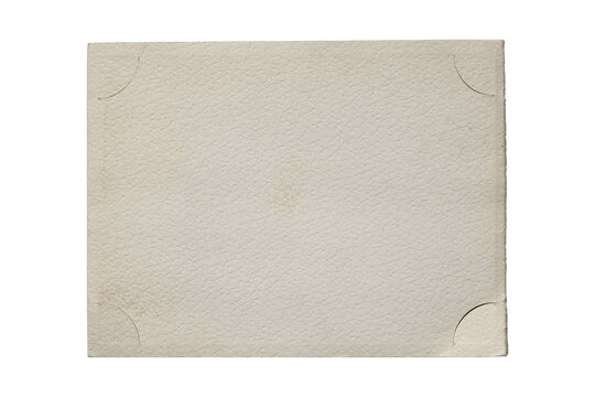 Vintage photo album page texture with corner slits, aged white paper background isolated on transparent
