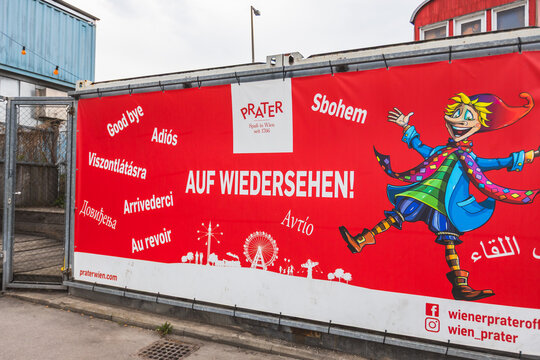 Multilingual farewell sign with Auf Wiedersehen at Prater park in Vienna