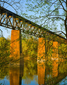 Old railroad track supported by stone pillars over the Potomac River along the C&O Canal in Sharpsburg, MD, USA