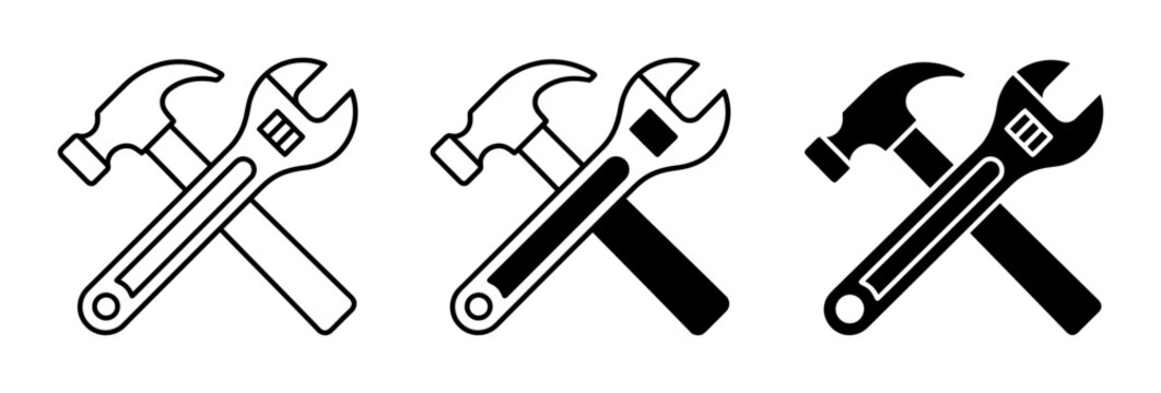 Three crossed hammer wrench silhouette icons set, solid black style, construction repair maintenance service tools