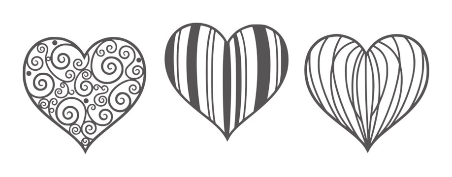 Three decorative hearts with different patterns white scrollwork