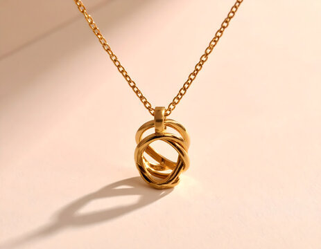 Modern Minimalist Gold: Minimalist gold jewelry display single statement piece on neutral background, elegant pendant showing refined luxury and calm beauty