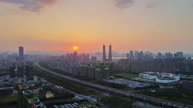 Suzhou China Skyline at Sunset with Skyscrapers and Highway Traffic