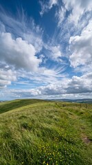 Obraz premium Breathtaking cloudscape and rolling hills nature background scenic landscape photography outdoor setting wide-angle view