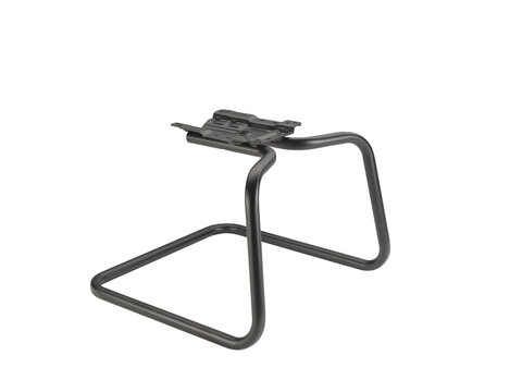 Still life of the iron structure of a chair, on a neutral background