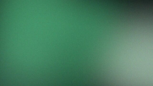 Emerald Green Abstract: A captivating gradient of rich emerald green, transitioning to a softer hue, evokes a sense of tranquility and depth.