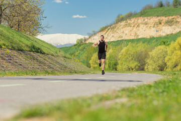 Obraz premium Man running on a track