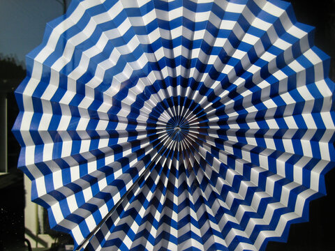 Blue and White Circular Zig Zag Fan Design